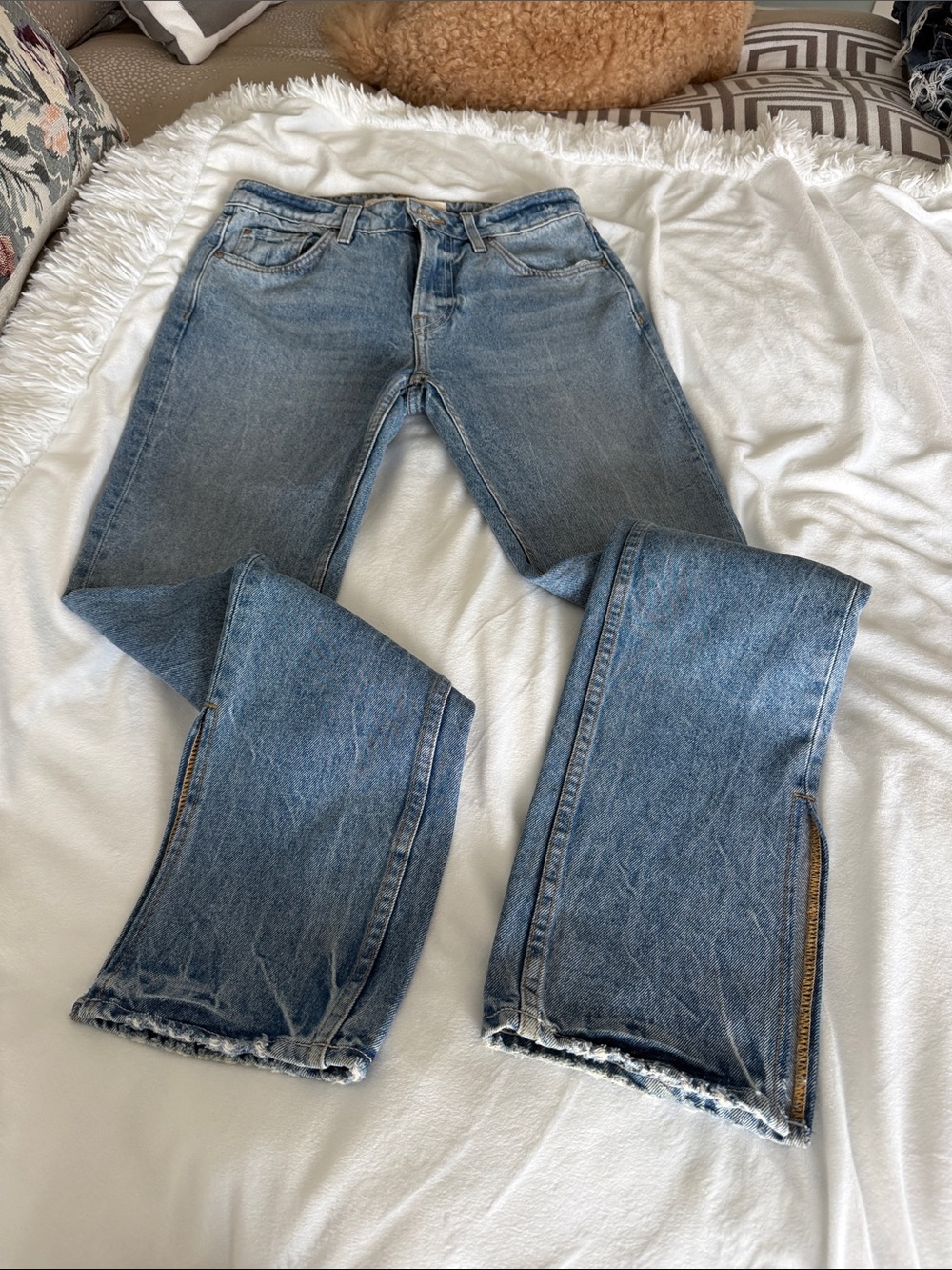 GRLFRND Light Blue Flared Jeans with Frayed Hem
